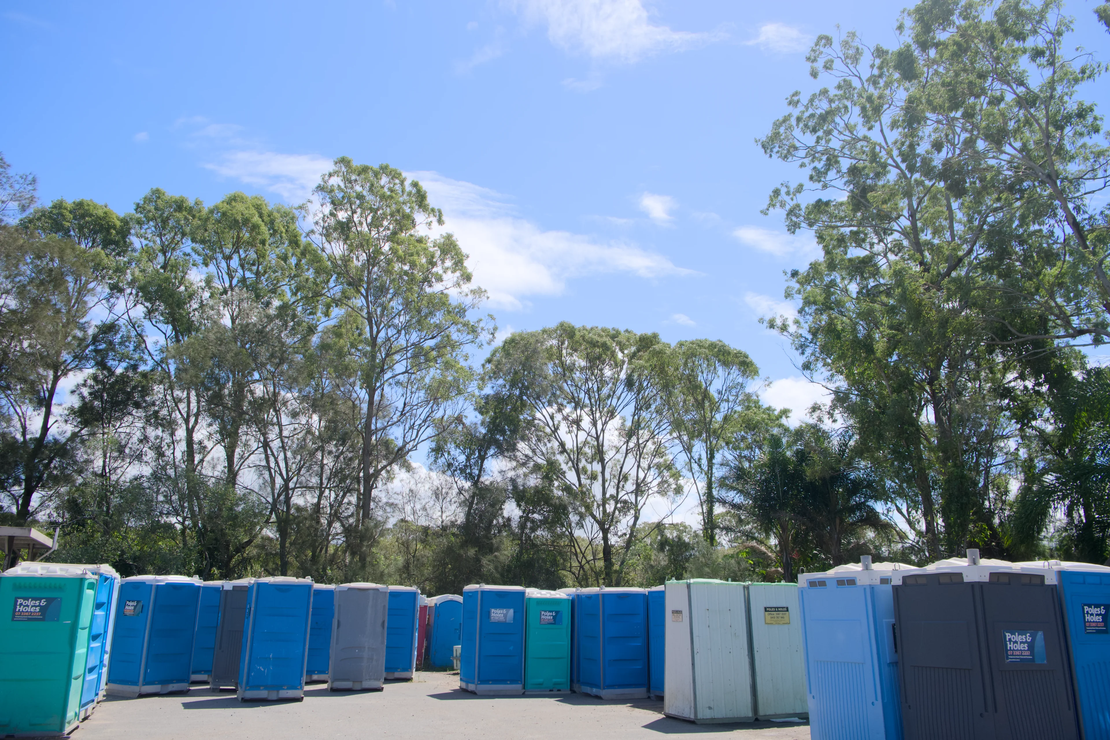 A Poles and Holes portable toilet delivered and placed on a site